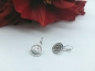 Preview: Glitzer Blumenornament Motiv Creolen Edelstahl Ohrringe